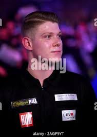 Nico Kurz is interviewed following his victory over Joe Cullen during day  eight of the William Hill World Championships at Alexandra Palace, London  Stock Photo