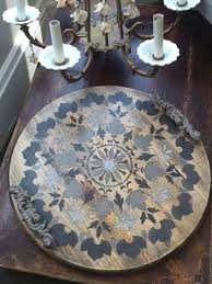 We Took A Round Unfinished Table Top And Waxed Using Black Chalk Paint Wax Then Stenciled With Royal Design St Stencil Furniture Diy Table Top Stenciled Table