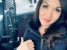 Yes that's an assault rifle. Yes I'm in the back of a police car. Yes this  is a regular day at work.