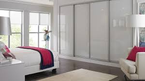 Contemporary home luxury high headboard bed high gloss rice white paint storage bed bedroom furniture. Sliding Wardrobes White Glass Fitted Wardrobes From Betta Living