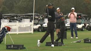 The sounds of impact sound nearly the same. Tiger Woods And Son Charlie Look Like Twins Swinging A Golf Club Espn Video