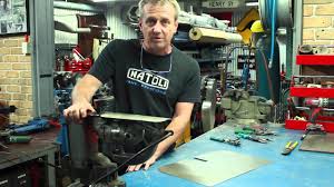 Peculiarities of seam roofing and types of the valley. How To Properly Cut Sheet Metal Using A Hand Tool