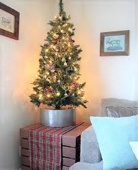 But we're most drawn to the diy tree stand here. Faux Galvanized Bucket Diy Christmas Tree Collar