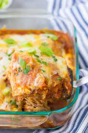 The tortillas go down first, followed by the refried beans, chicken, and cheese. Chicken Enchilada Casserole Easy 4 Ingredient Recipe