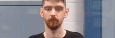 Man accused of firing four shots from Charleston apartment complex