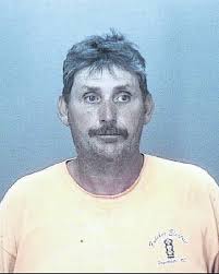 Couple charged with exploiting elderly woman