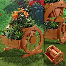 Pflanzkubel Mit Wagenrader Aus Holz Garten Dekoration Blumentrog Holzkasten Jardinagem E Decoracao Ideias De Jardinagem Artesanato Em Madeira