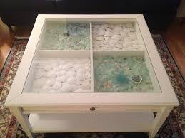 Sea Glass Sand Dollars Displayed In A Glass Top Coffee Table This Is My Aunt S And I Absolu Shadow Box Coffee Table Display Coffee Table Ikea Coffee Table