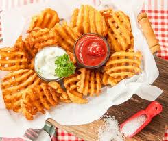 Use a mandolin or fries' cutter with a waffle blade to cut your fries. Air Fryer Frozen Waffle Cut Fries Fork To Spoon