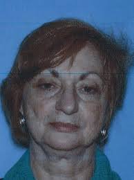 Woman, 70, accused of abusing her great-grandchildren turns herself in