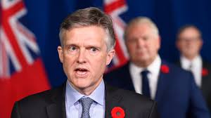 Ontario finance minister resigns after tropical vacation