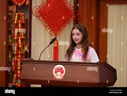 Chicago, USA. 4th Mar, 2020. Ava Moore, a 6th grader at Chicago's  Intercultural Montessori Language School, speaks during a donation ceremony  held in Chicago, the United States, on March 4, 2020. To