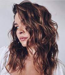 For women with fine, wavy hair, a short haircut can look absolutely gorgeous. 25 Volume Boosting Haircuts For 2021 Even Dolly Parton Would Approve Of Long Wavy Hair Long Wavy Haircuts Haircuts For Wavy Hair