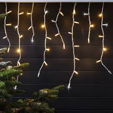50 lights 50 clear plastic icicle ornaments. 2m 100 Warm White Sparkling Led Connectable Icicle Lights White Cable Lights4fun Co Uk