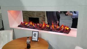 An electric fireplace is an electric heater that mimics a fireplace burning coal, wood, or natural gas. Dimplex Opti Myst Electric Fireplace Youtube