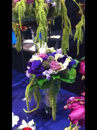 With our fourth generation in the florists business you can count on us for all your floral needs. Blue Orchid Bridal Bouquet By Woods Flowers