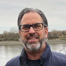 The “West Coast/moon” reference is to the great Shaq moment when he said  the moon must be closer than the West Coast, because he can see the moon  but he can't see