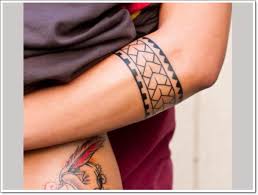 Let's have a look at them Attractive Armband Tattoo On Left Forearm