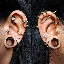 No 1 Piercings On Instagram Left Or Right By Nyxandstones Piercings Piercing Small Diamond Stud Earrings Hammered Hoop Earrings Piercings Unique