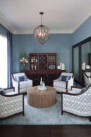 Simple accents include pottery and an orchid in the center of the oak coffee table. 15 Circular Conversation Seating Areas 4 Chairs Around A Coffee Table The Indigo Lattice