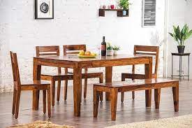 Teak dining sets available in round, square, rectangular and oval shapes. Buy Solid Wood Teffe Dining Set With Bench 6 Seater Honey Finish Online In India Latest Dining Sets Saraf Furniture
