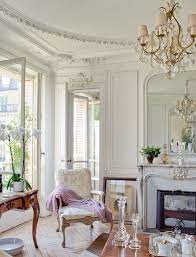 Modern Parisian Homes That Will Have You Packing Your Bags Parisian Apartment Decor Paris Living Room Decor Paris Living Rooms