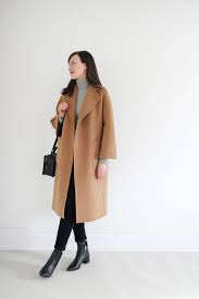 I think a camel coat is a great choice for elegant outfits. The Curated Classic Camel Coat Review