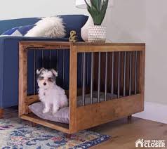 There is a divider in the middle so each dog has their own room and the doors on the end close with a magnet. 50 Diy Dog Crates That Are Decorative And Comfortable The Paws