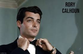 American actor, producer, screenwriter Rory Calhoun at the wheel of an 1947  MG TC sports Roadster! Rory Calhoun (born Francis Timothy McCown, August 8,  1922