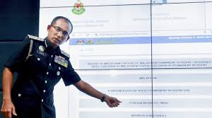 Mohamed abdo ali mohamed, wearing a suit, stands with his three sons in malaysia in 2015.family photo. Malaysia Mytravelpass To Help Those Seeking Entry Or Exit Permits During Covid 19 Period Emp Global Resources
