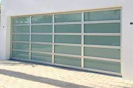 Maybe you would like to learn more about one of these? Transform Your Home S Appearance With The Modern Look Of A Hurricane Impact Rated Glass And Aluminum Garag Glass Garage Door Garage Doors Garage Doors For Sale