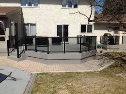 Our winnipeg deck company is an authorized tufdek dealer, which allows us to sell and install tufdek waterproof vinyl deck coverings throughout the greater winnipeg area. Duradek Waterproof Deck S T A R Aluminum Railing With Tinted Glass Glass Porch Glass Railing Deck Deck Railings