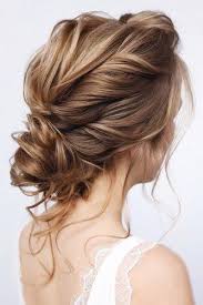 Add some small flowers to your braided updo for enhanced femininity. 39 Perfect Wedding Hairstyles For Medium Hair Wedding Forward