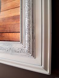 The chevron patterned floor and whimsical legs of the side tables add energy and excitement to the hallway, contrasted sharply with the warmth of the antique mirror. How To Build A Custom Frame Out Of Trim Pieces Reality Daydream
