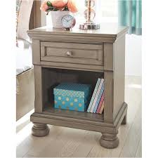 The envelo nightstand�s walnut drawer is cased in brilliant matte black lacquer, making it the center of attention. B733 91 Ashley Furniture Lettner Kids Room One Drawer Night Stand