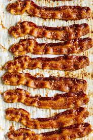 Learn How To Cook Bacon In The Oven It S Easy And Creates Perfectly Crispy Bacon Every Time Bacon In The Oven Cooking Cooking Bacon