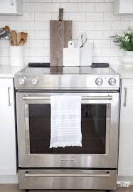 Our Dark To White Kitchen Remodel Before And After Stainless Appliances Kitchen Steel Kitchen Appliances White Kitchen Remodeling
