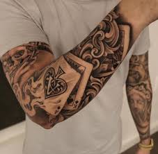 Playing cards tattoo on shoulder. Playing Cards Best Tattoo Ideas For Men Women