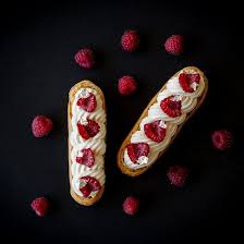 Hazelnut White Chocolate And Raspberry Eclairs In French Eclairs Raspberry Eclairs Candy Desserts