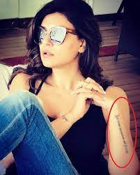 There is a tattoo of a blue and black star, on the right wrist of the actor below the head of the bobcat. Sushmita Sen S 6 Tattoos Their Meanings Body Art Guru