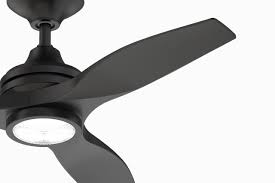 A ceiling fan in a contemporary style with clean angles and a sleek finish blends in perfectly with a modern layout. Spitfire Fanimation