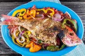 Mediterranean Whole Roasted Red Snapper With Garlic And Bell Peppers The Mediterranean Dish An Easy Mediterranean Dishes Snapper Recipes Red Snapper Recipes
