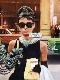 The 1961 film breakfast at tiffany's , based on truman capote's novella, starred audrey hepburn as holly golightly, one of the most iconic characters to ever appear on screen. Breakfast At Tiffany S Audrey Hepburn 1961 Photo Allposters Com