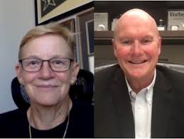 Bruce Evans and Vice Admiral Nora Tyson