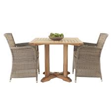 Two Classics Come Together To Create This Lovely And Charming Outdoor Dining Set It Features An A Grade Teak Pedestal Dining Table With Two Gi Wicker Dining Set