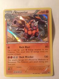 Hp = heavily played, p = played, vg = very good, nm/m = near mint/mint, psa is a grading company. Amazon Com Pokemon Rhyperior 62 146 Xy Holo Toys Games