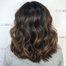 This lob is cut bluntly on the ends with some classic layers. 50 Haircuts For Thick Wavy Hair To Shape And Alleviate Your Beautiful Mane