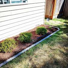 Creating several tiers on a sloped property can help manage erosion and give you the opportunity to layer different plants and landscaping elements for a cohesive design. The Top 42 Garden Edging Ideas