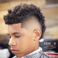 Curly mohawks combine the appeal of faded sides and a thick top with curled or wavy hair. 41 Mohawk Haircuts That Make A Statement 2021 Trends Styles