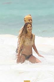 Niamh Adkins topless in a water